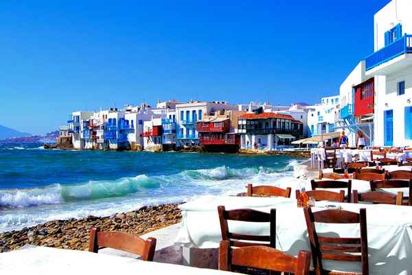 | greece mykonos seaside town with waves